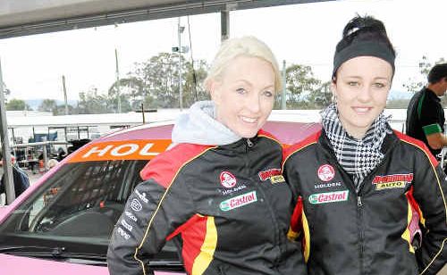 Racers Belinda Halliwell and Brooke Leech prepare for practise runs yesterday. Racers Belinda Halliwell and Brooke Leech prepare for practise runs yesterday.